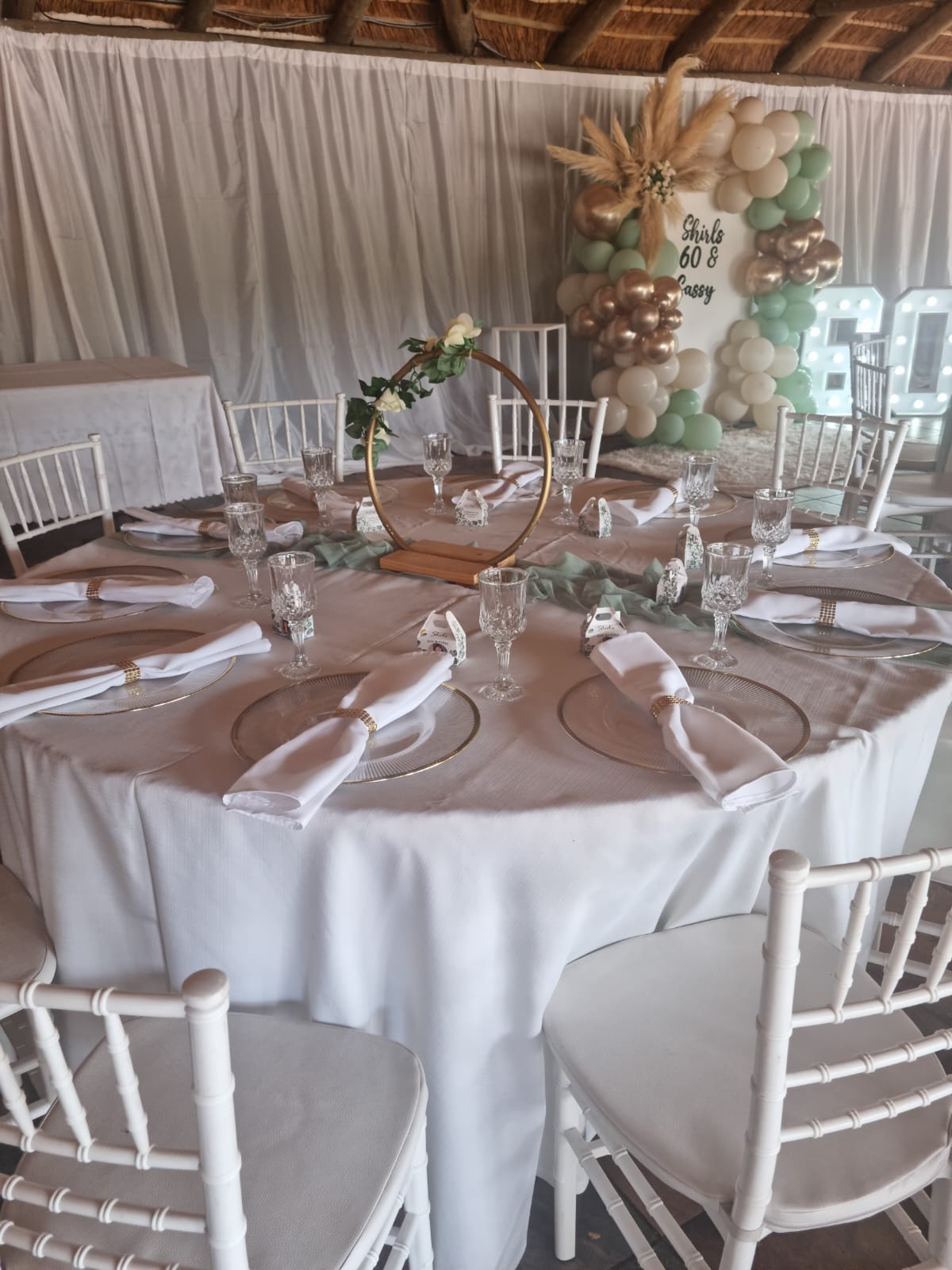 Round table dressed in white linen
